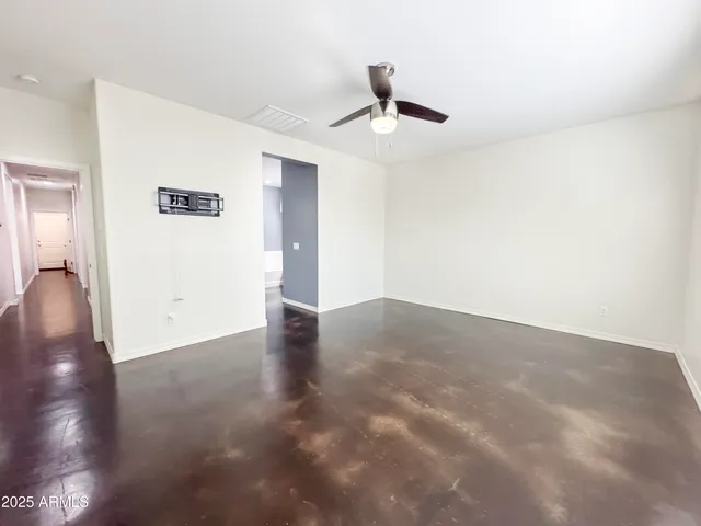 a view of room window and wooden floor