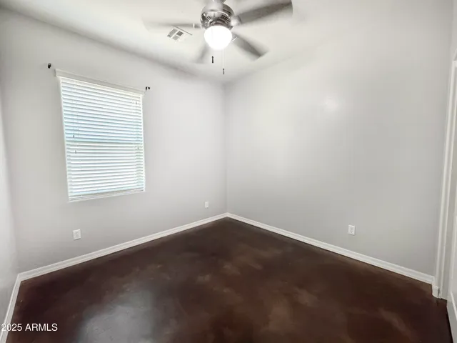 a view of a bathroom with white walls