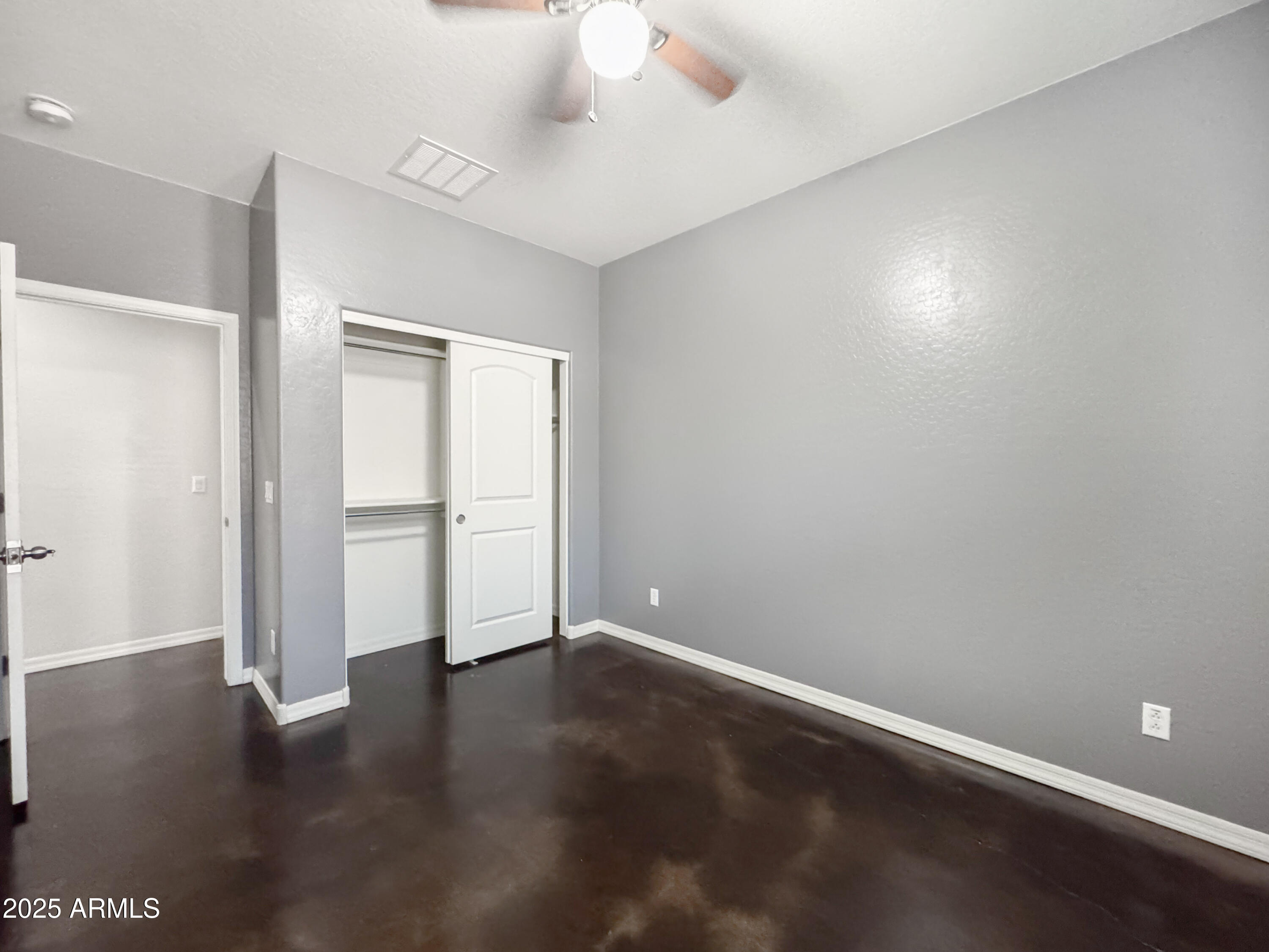 3141 East Patrick Street Gilbert, AZ 85295 - Photo 24 of 32 a view of an empty room with wooden floor
