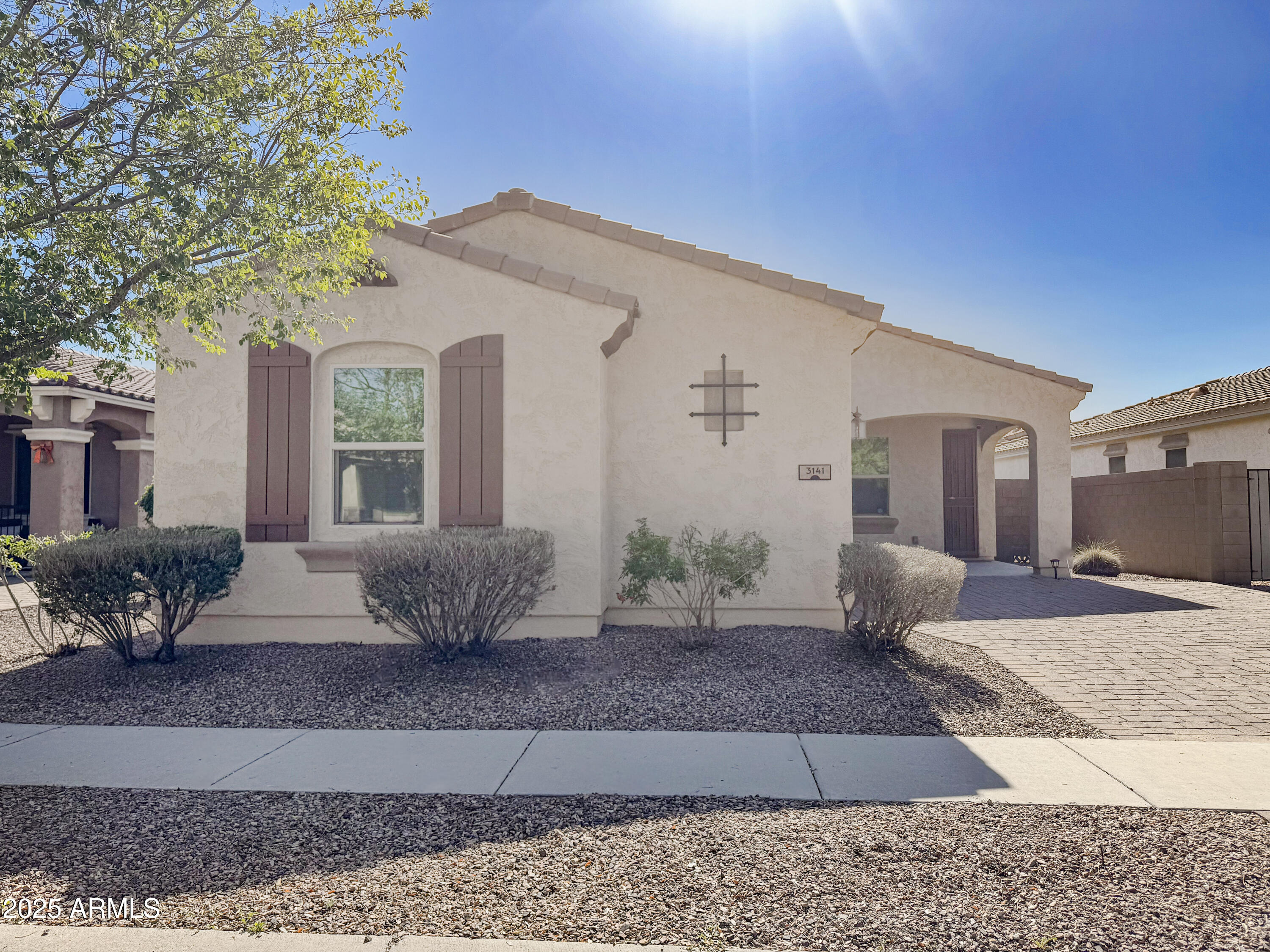 3141 East Patrick Street Gilbert, AZ 85295 - Photo 2 of 32 a view of a house with a patio