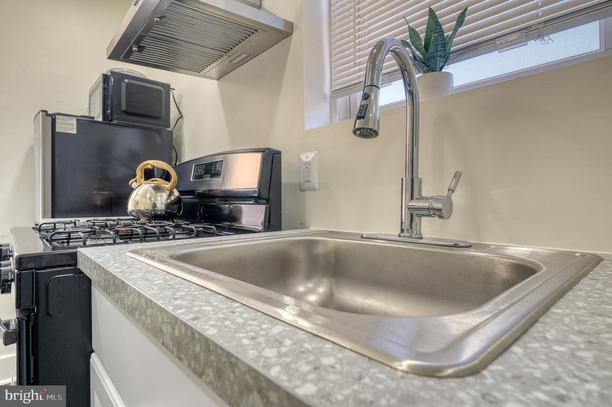 7104 Harford Road Baltimore, MD 21234 - Photo 14 of 37 a close view of sink and tap