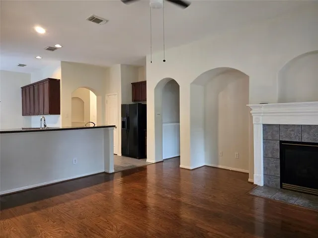 a view of kitchen with furniture and a fireplace
