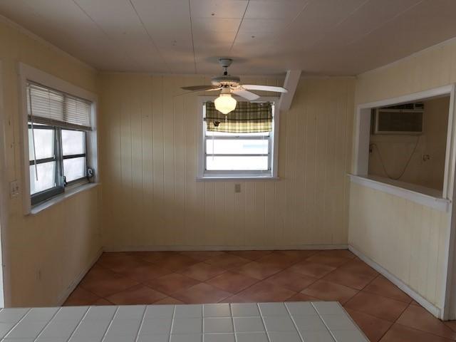 1320 Virginia Street Key West, FL 33040 - Photo 2 of 11 an empty room that has a window