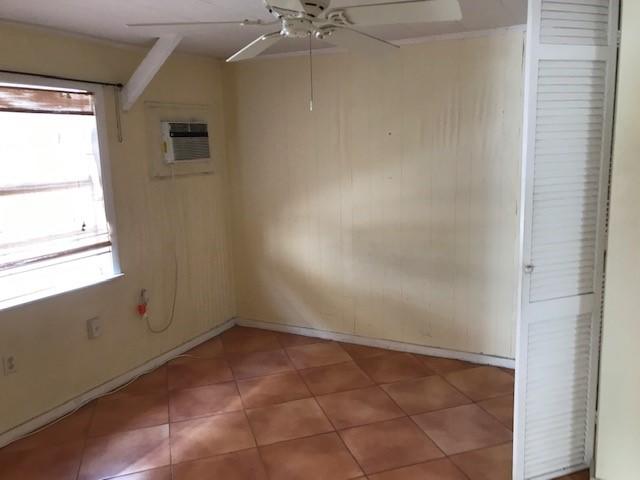 1320 Virginia Street Key West, FL 33040 - Photo 7 of 11 a view of an empty room with a window