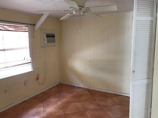 1320 Virginia Street Key West, FL 33040 - Photo 10 of 11 a view of an empty room with a window