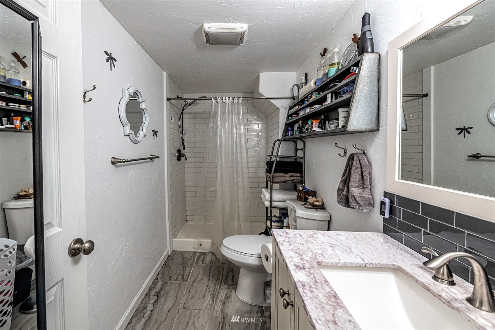 152 Locust Street Walla Walla, WA 99362 - Photo 22 of 38 a bathroom with a sink a toilet and shower