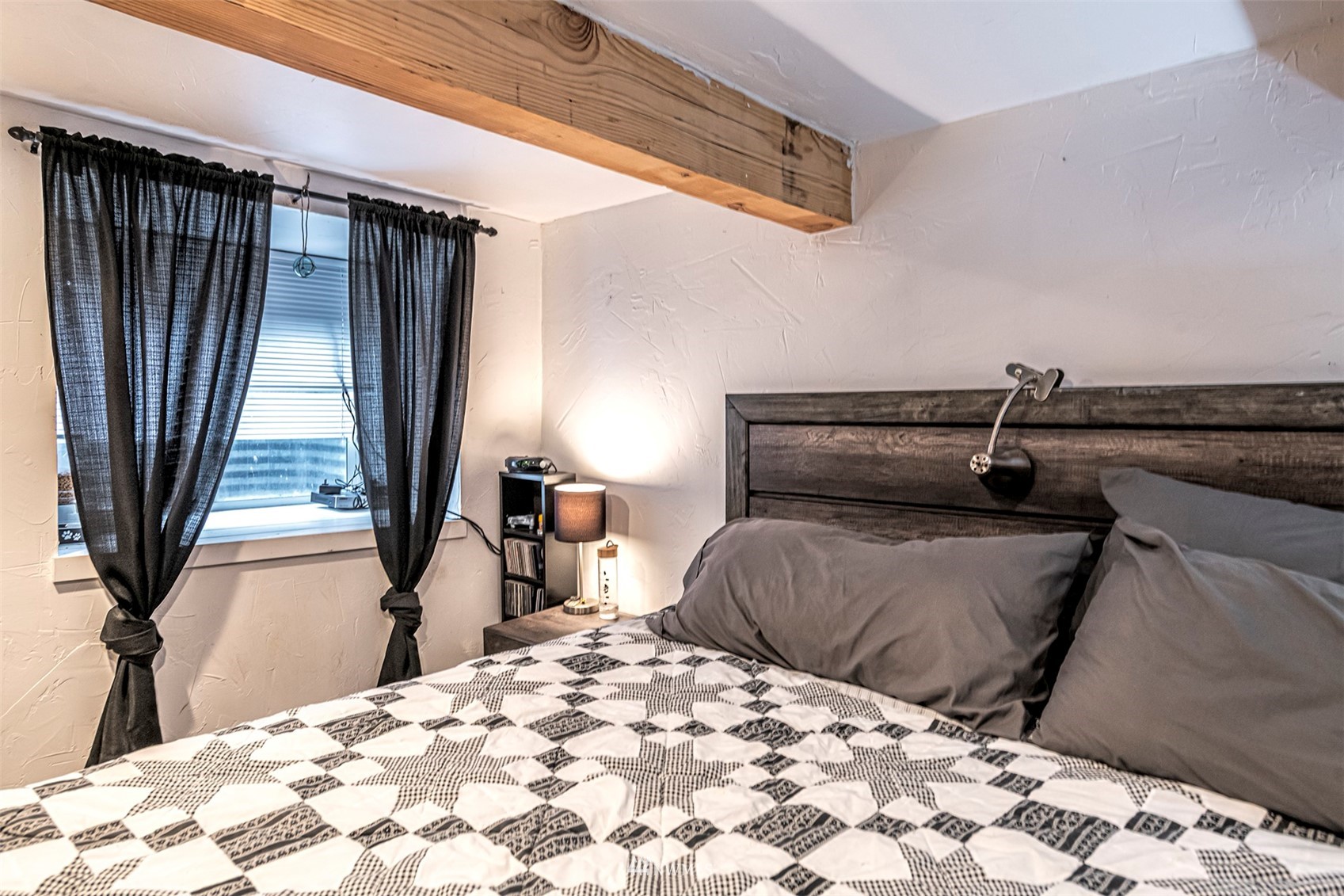 152 Locust Street Walla Walla, WA 99362 - Photo 23 of 38 a bedroom with a bed and a dresser next to a window