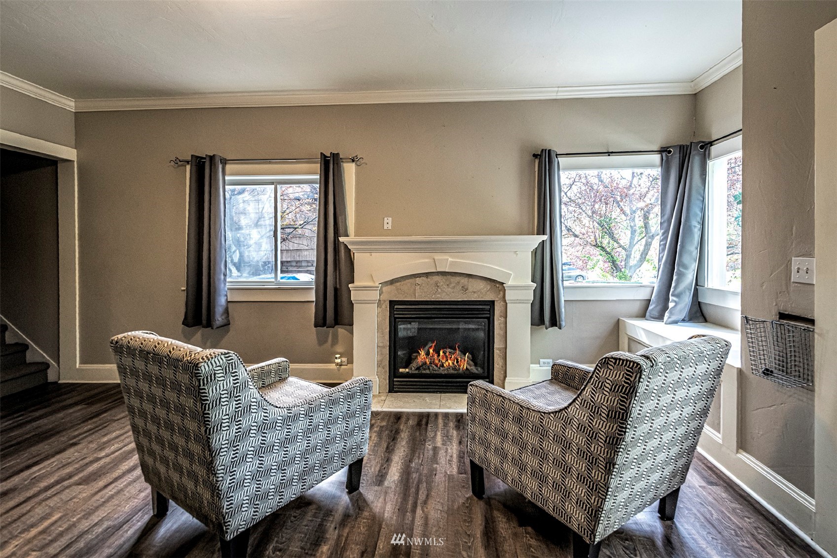 152 Locust Street Walla Walla, WA 99362 - Photo 7 of 38 a living room with furniture and a fireplace