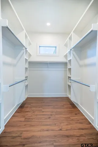 a view of an empty walk in closet
