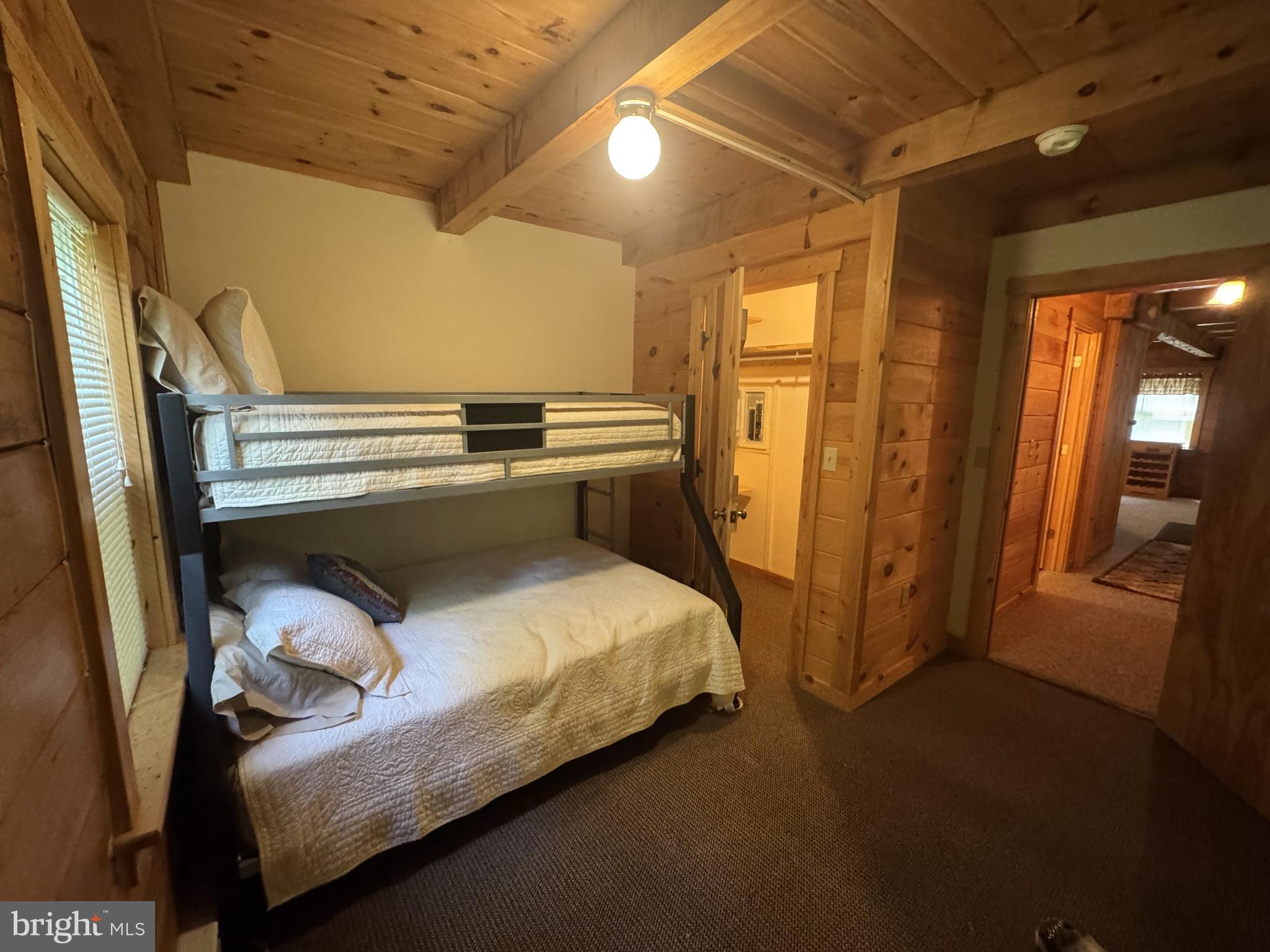 56 Ponderosa Way Milroy, PA 17063 - Photo 21 of 55 a bedroom with a bed and wooden floor