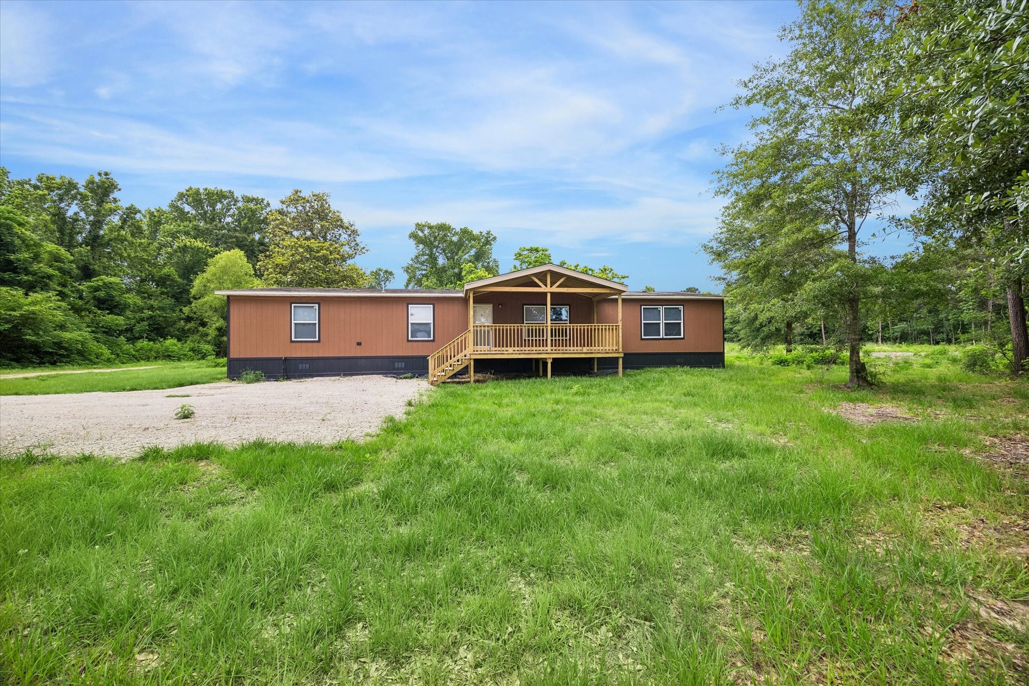 30 Timm Cleveland, TX 77327 - Photo 2 of 10 front view of a house with a big yard