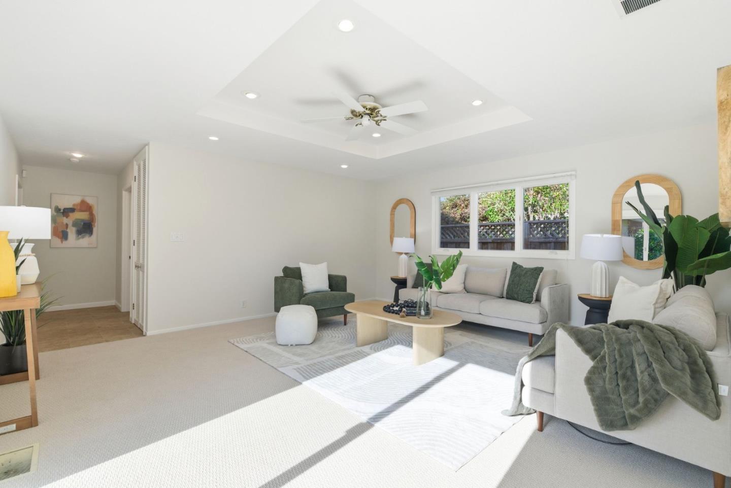 1747 Walnut Drive Mountain View, CA 94040 - Photo 13 of 38 a living room with furniture a couch and a chandelier
