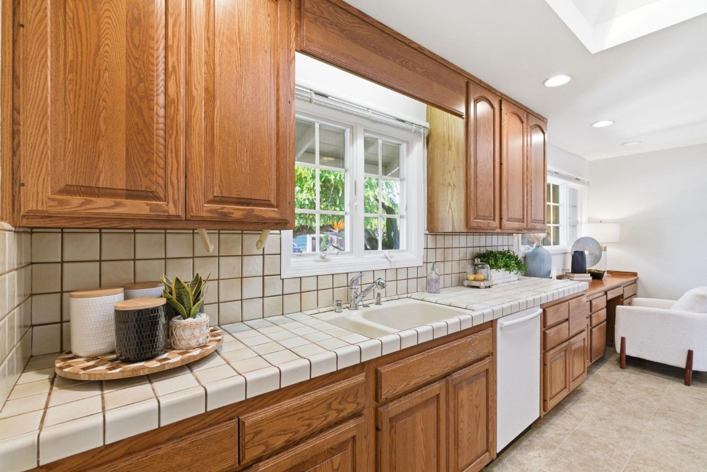 1747 Walnut Drive Mountain View, CA 94040 - Photo 16 of 38 a kitchen with a sink and cabinets