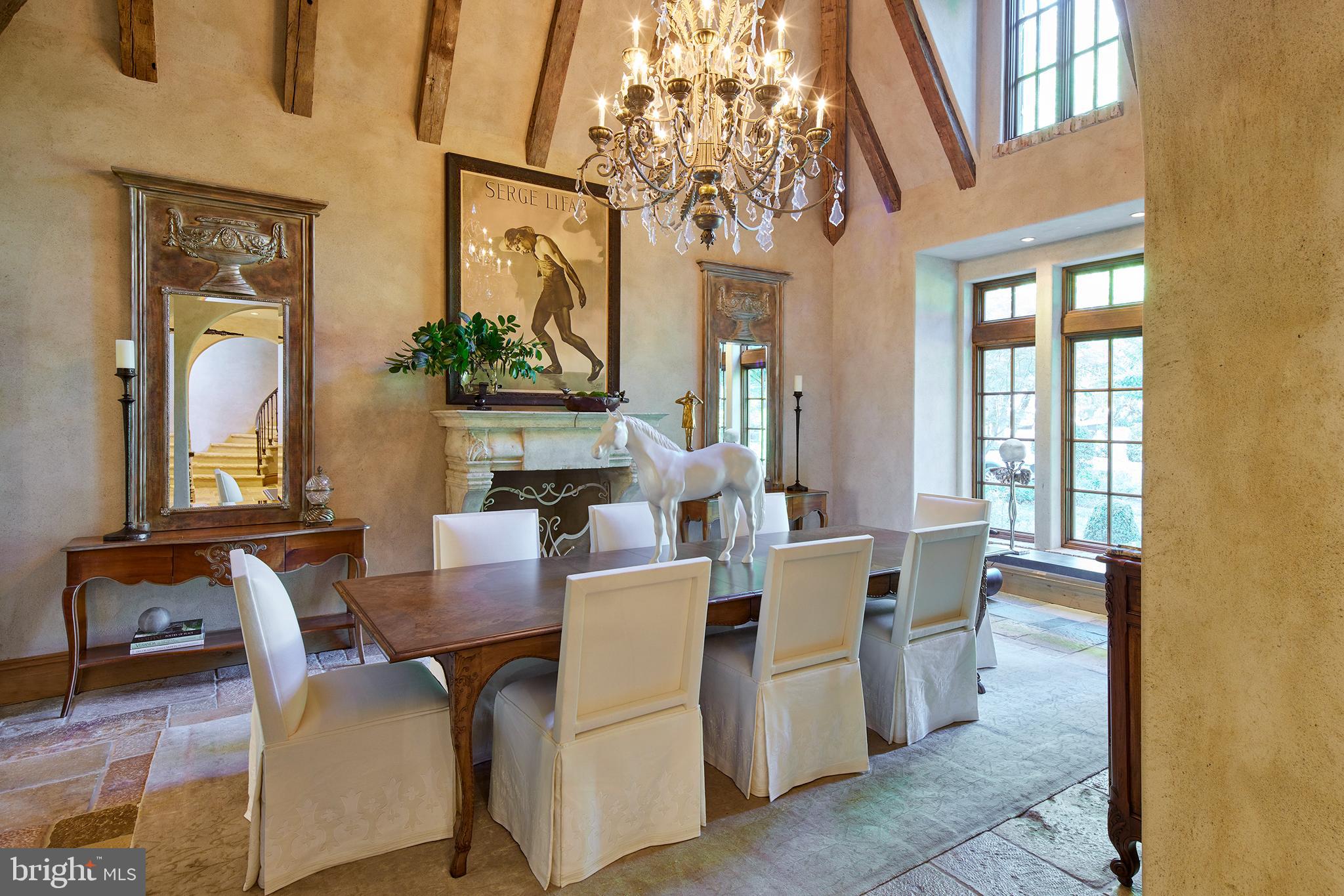 1113 Langley Lane McLean, VA 22101 - Photo 7 of 50 Double-height dining with barn wood beams