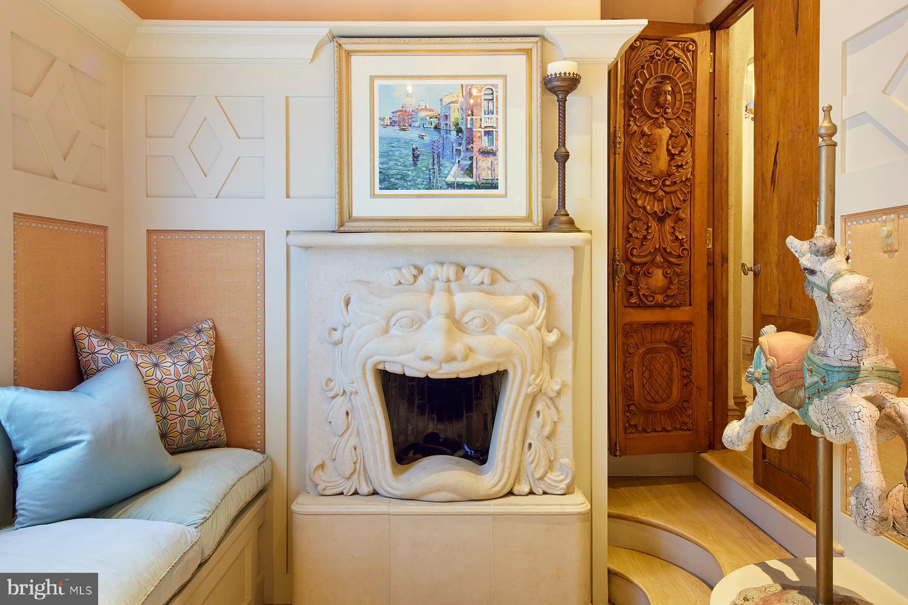 1113 Langley Lane McLean, VA 22101 - Photo 10 of 50 Mantle in the image of Dionysus, god of winemaking