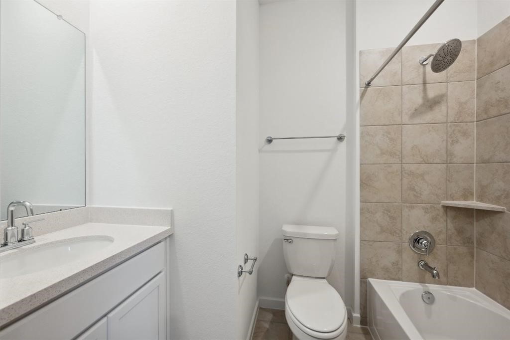 21918 Wycombe Terrace Way Cypress, TX 77433 - Photo 27 of 43 a bathroom with a sink toilet and shower