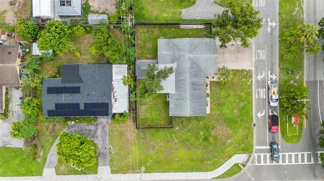 an aerial view of a house having yard