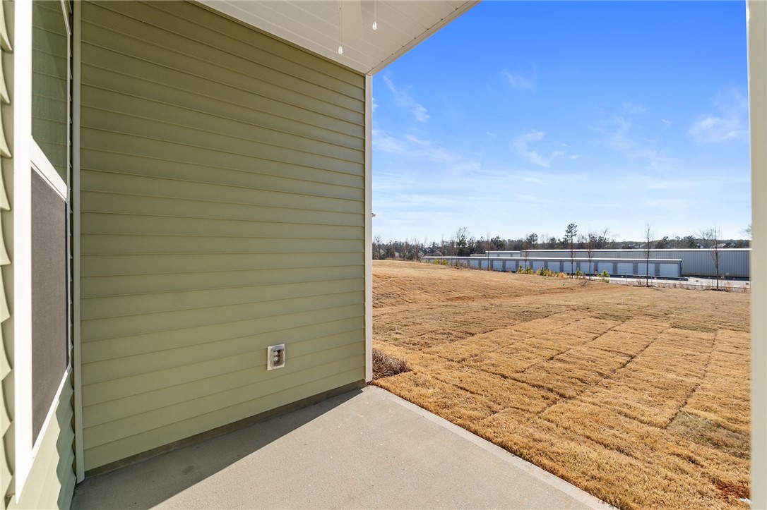 138 Cotesworth Street Pendleton, SC 29670 - Photo 16 of 19 This private patio offers a tranquil retreat with views of expansive, open land.