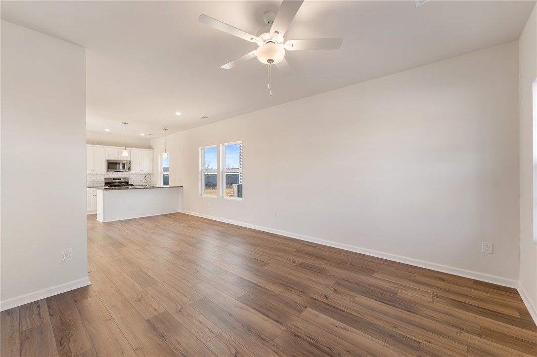 138 Cotesworth Street Pendleton, SC 29670 - Photo 2 of 19 This airy open-concept space features hardwood floors, a bright kitchen, and abundant natural light.