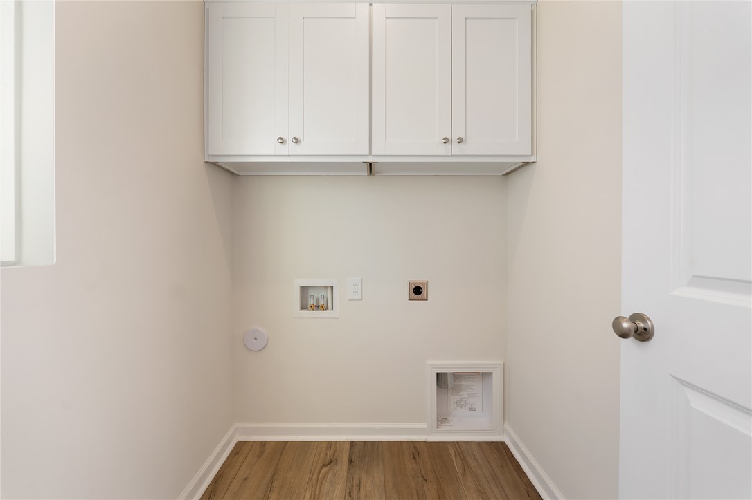 138 Cotesworth Street Pendleton, SC 29670 - Photo 7 of 19 This functional space offers convenience and efficiency for daily chores.