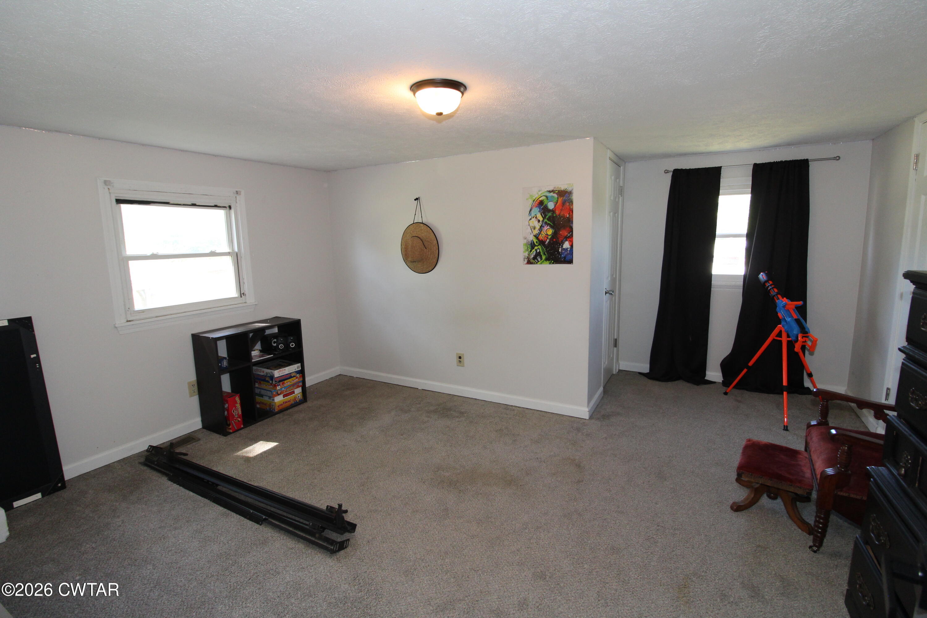 33 Kipling Drive Jackson, TN 38305 - Photo 15 of 20 a room with gym equipment and a window