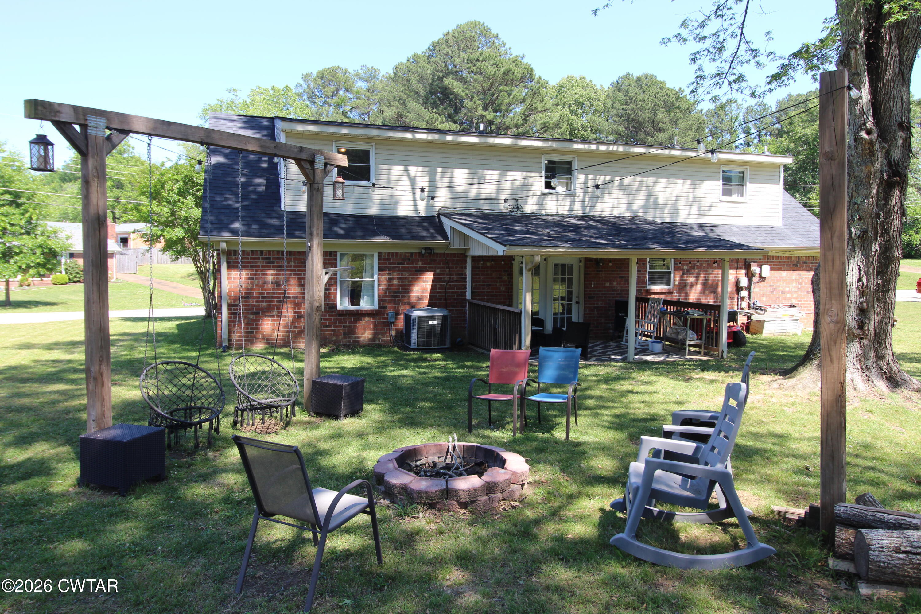33 Kipling Drive Jackson, TN 38305 - Photo 19 of 20 a front view of house with a garden and patio