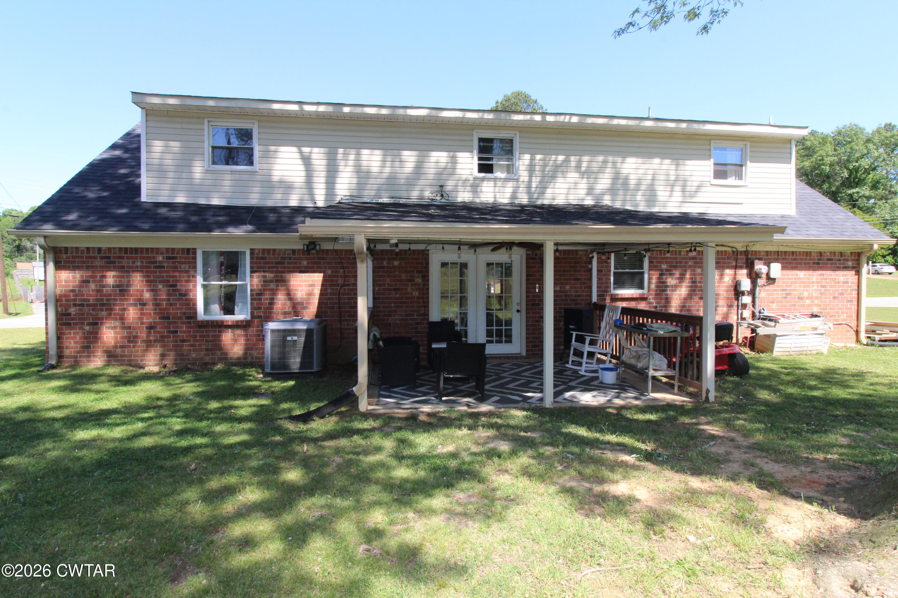 33 Kipling Drive Jackson, TN 38305 - Photo 20 of 20 a view of a house with a porch and furniture