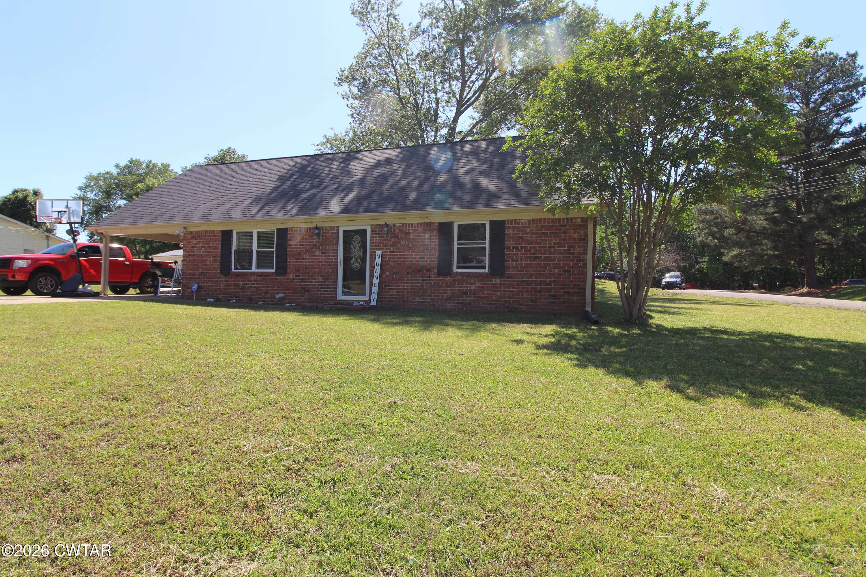 33 Kipling Drive Jackson, TN 38305 - Photo 2 of 20 a view of a house with a yard