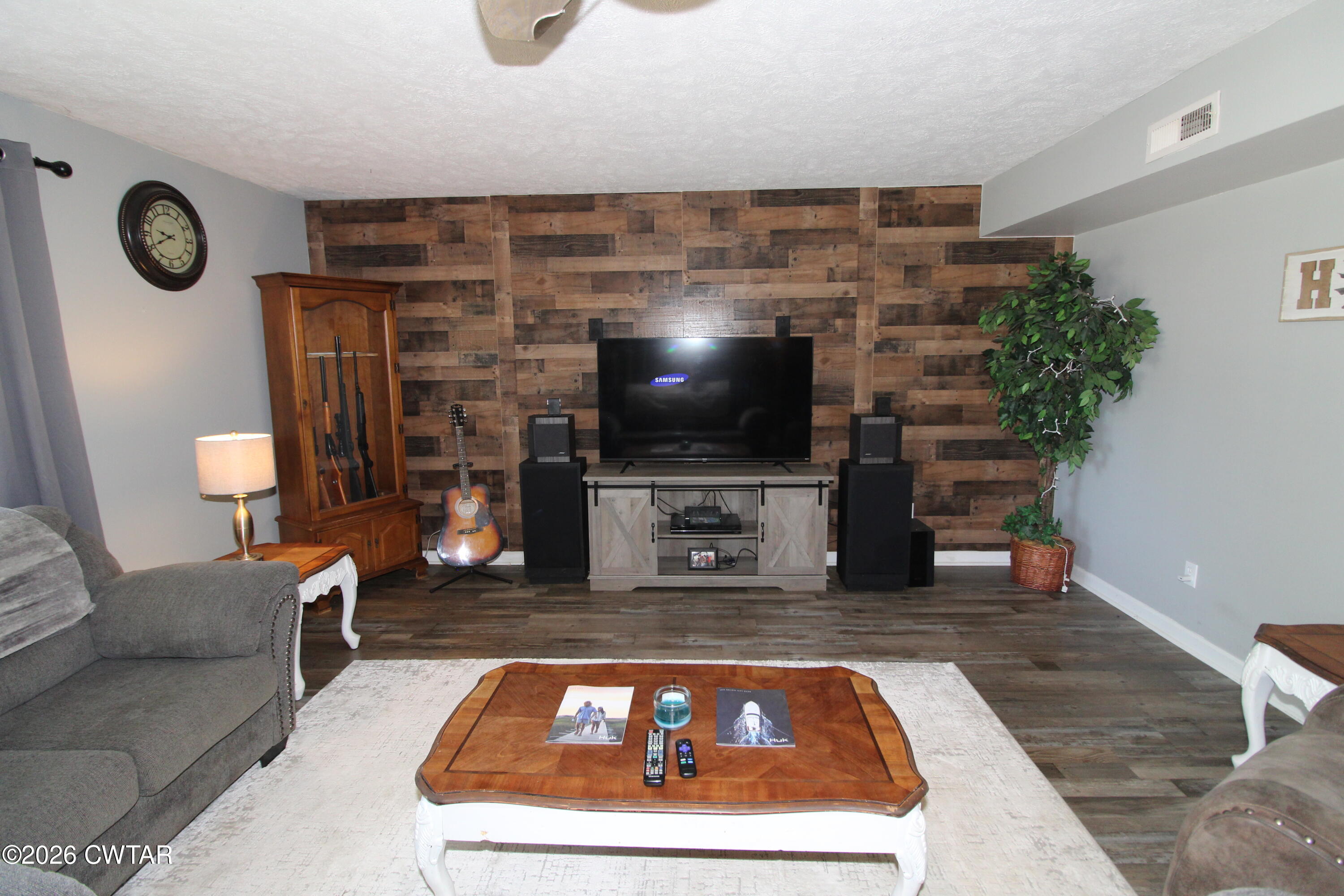 33 Kipling Drive Jackson, TN 38305 - Photo 3 of 20 a living room with furniture and a flat screen tv