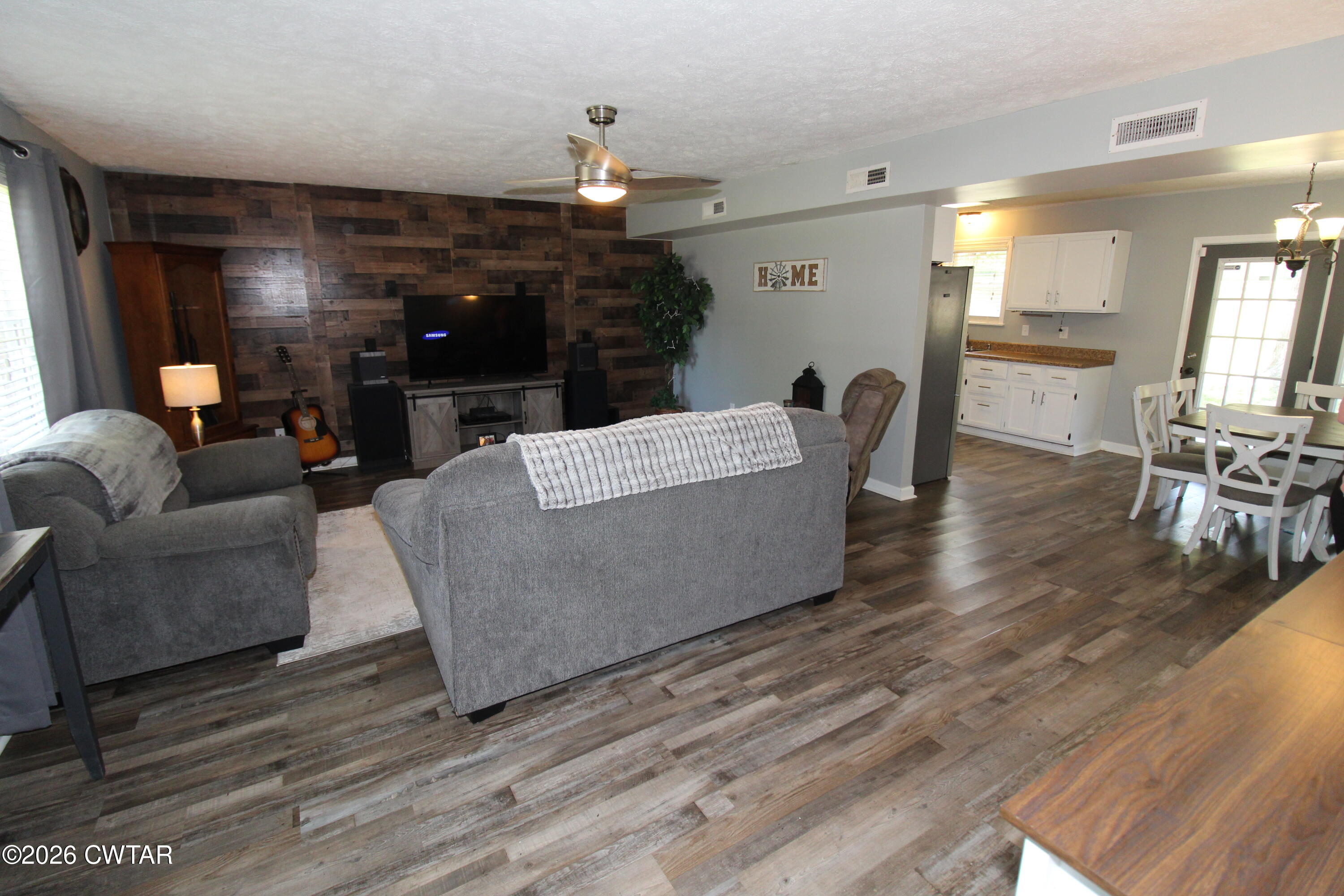 33 Kipling Drive Jackson, TN 38305 - Photo 5 of 20 a living room with furniture and a wooden floor