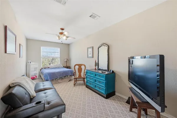 a view of a livingroom with furniture and workspace