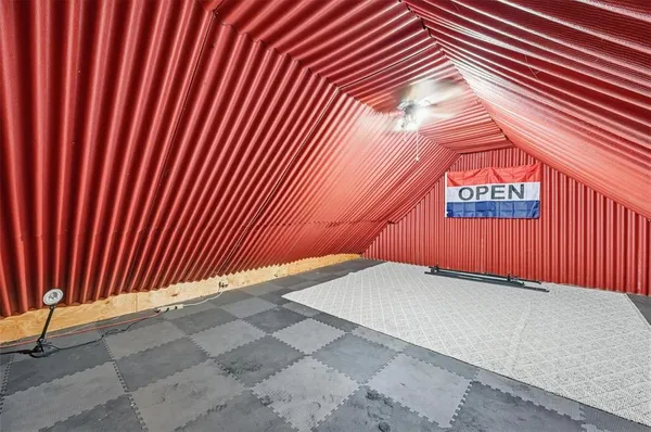 an aerial view of a house with a garden