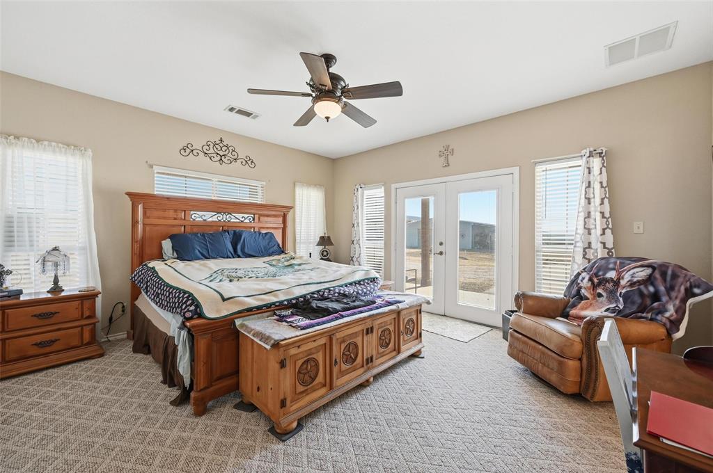 346 Forreston Road Waxahachie, TX 75165 - Photo 9 of 36 a living room with furniture and a chandelier