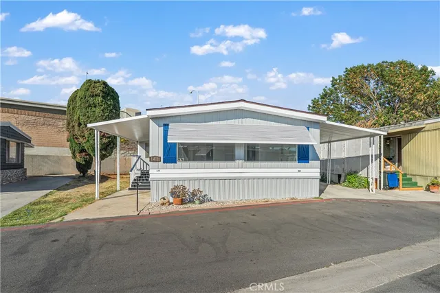 a view of a house with a street