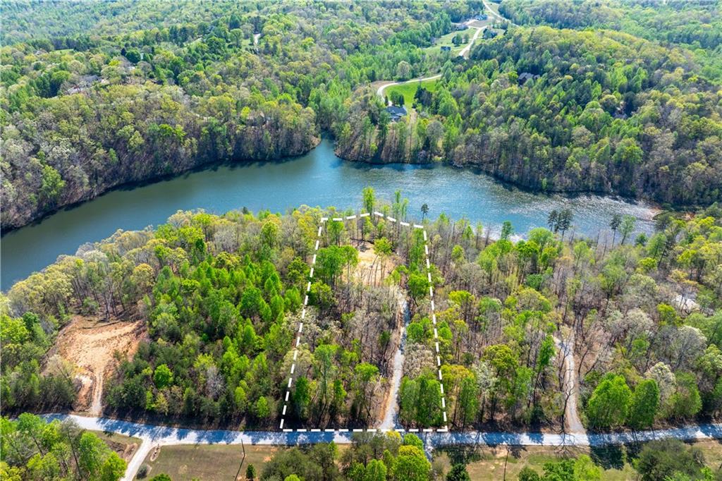 940 Purvis Road Baldwin, GA 30511 - Photo 19 of 28 a view of a lake with houses