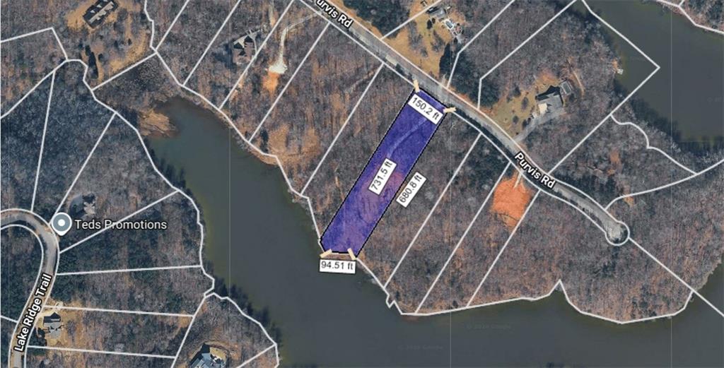 940 Purvis Road Baldwin, GA 30511 - Photo 3 of 5 a view of staircase with railing and white walls