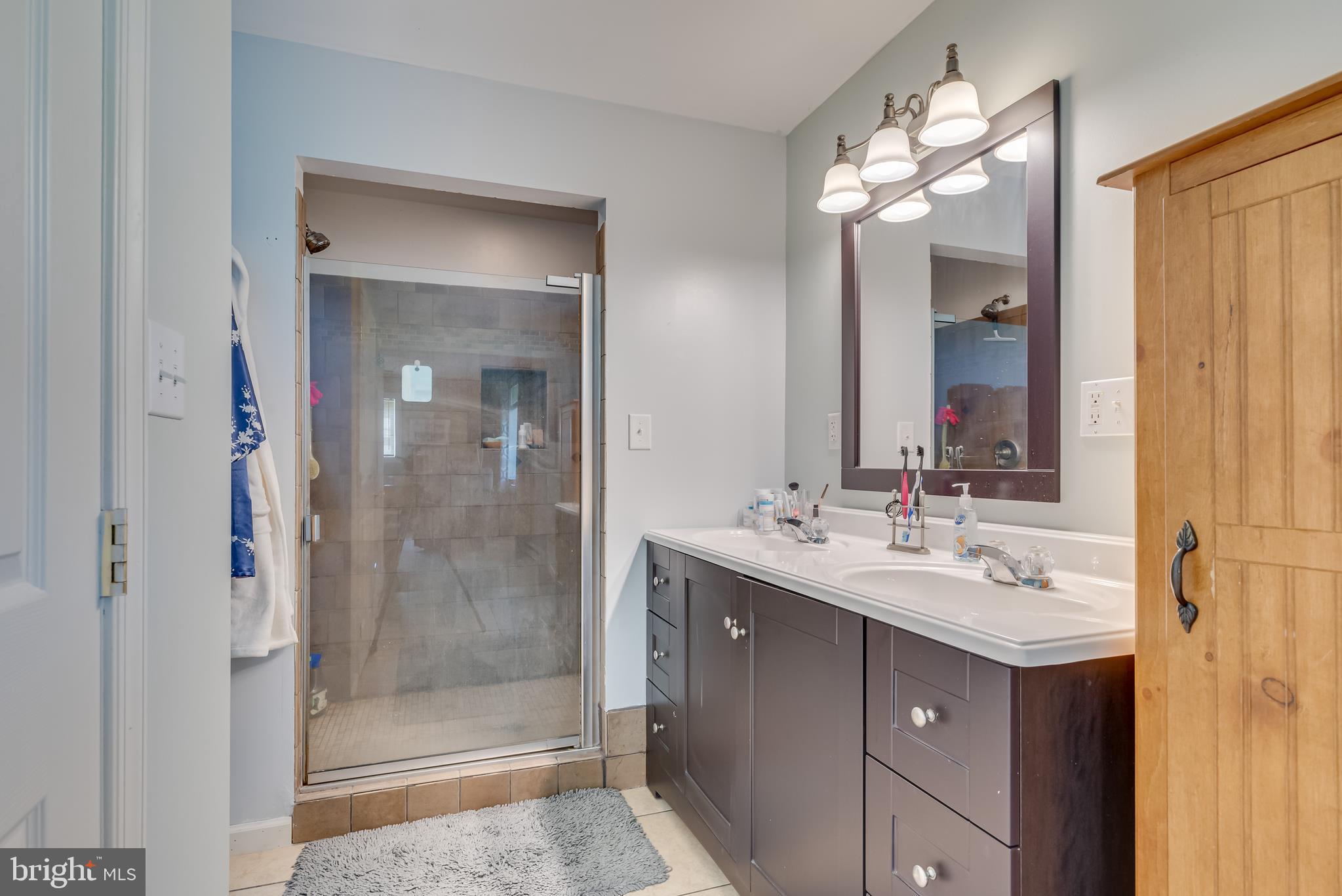 1268 Duckwall Road Berkeley Springs, WV 25411 - Photo 23 of 71 Master bath has a modern double bowl vanity