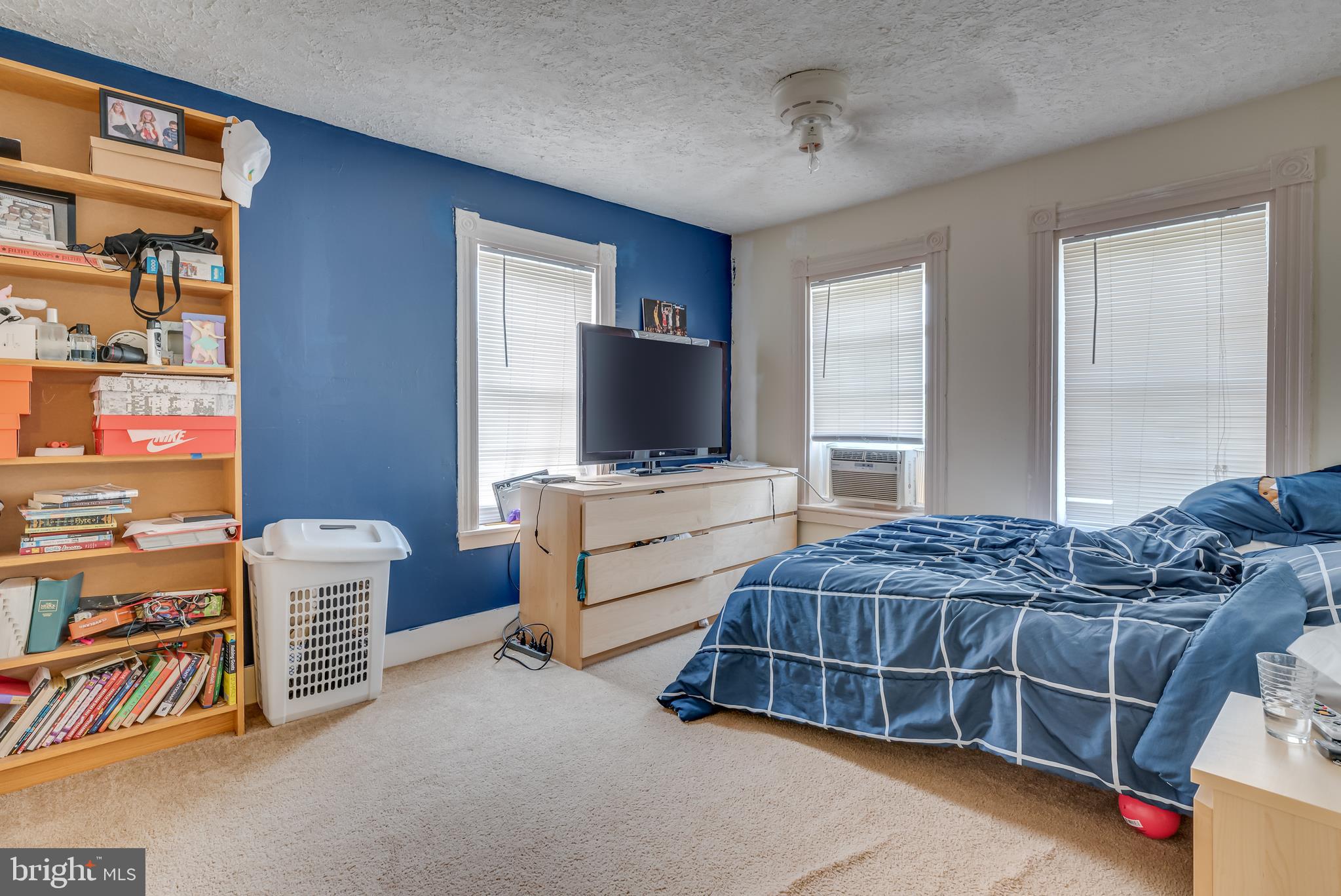 1268 Duckwall Road Berkeley Springs, WV 25411 - Photo 27 of 71 Bedroom 1 w/ neutral carpet + ceiling fan