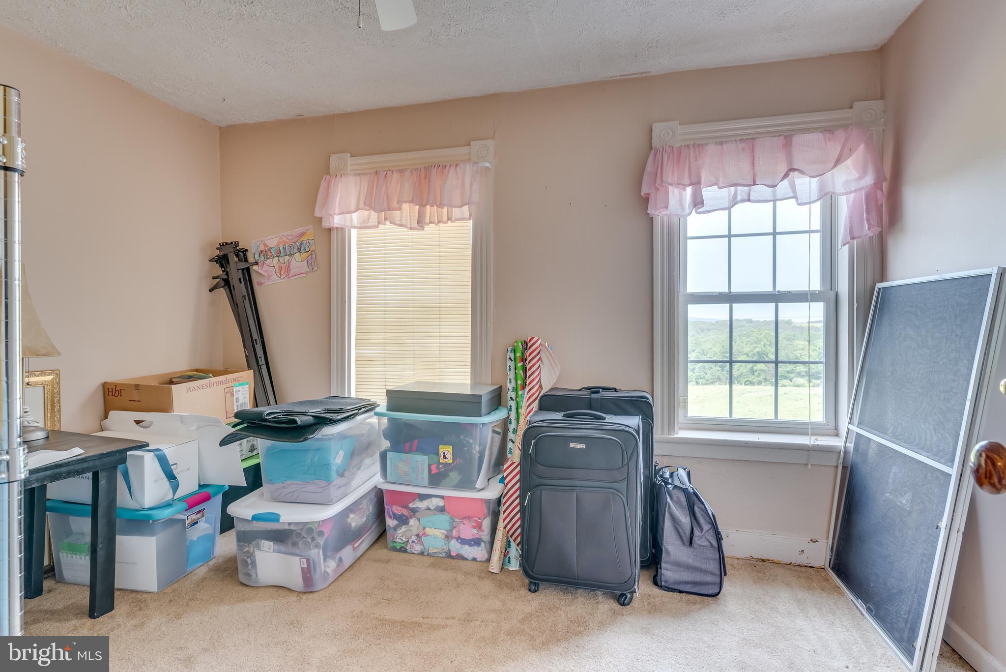 1268 Duckwall Road Berkeley Springs, WV 25411 - Photo 30 of 71 Bedroom 2 has neutral paint and carpeting