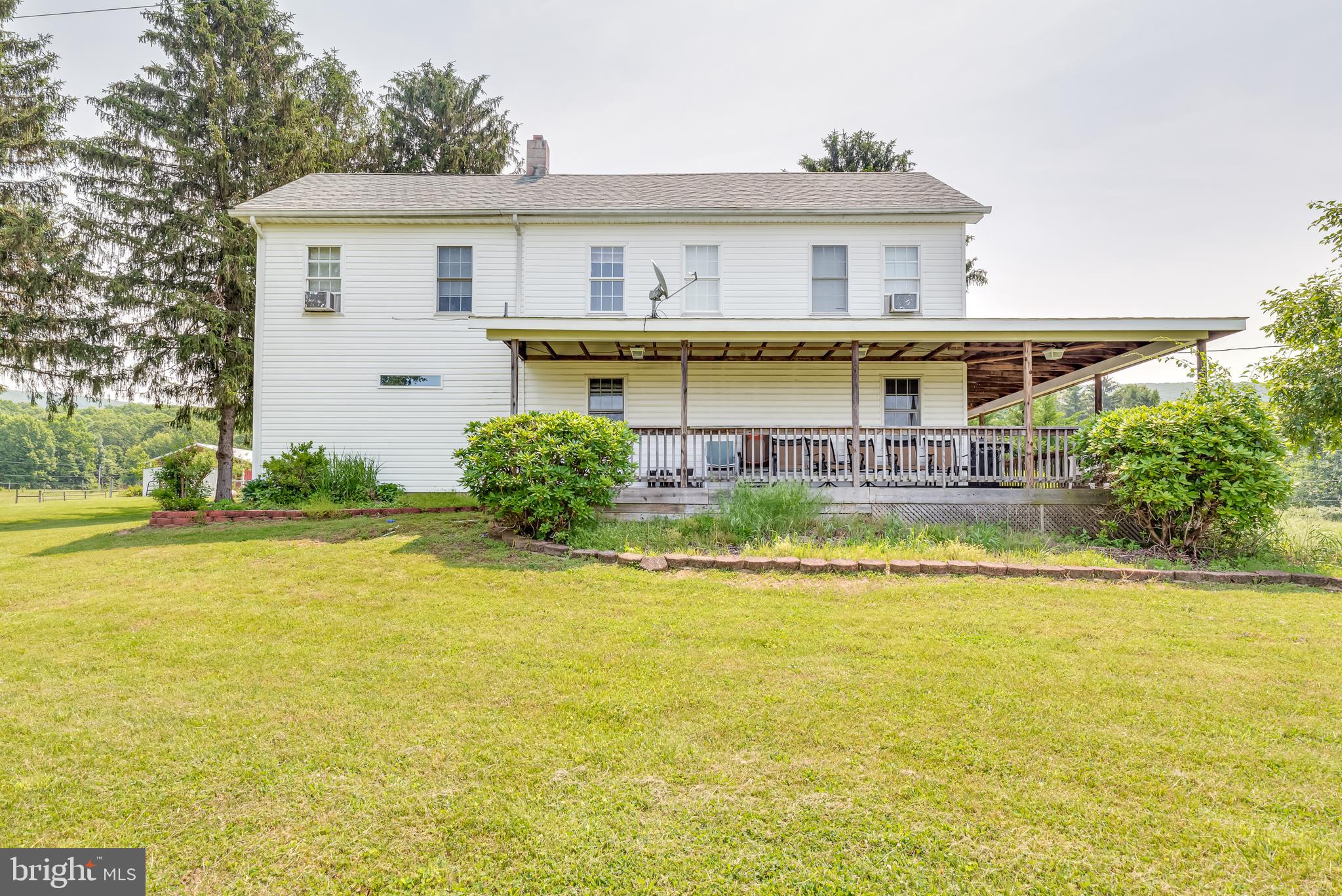 1268 Duckwall Road Berkeley Springs, WV 25411 - Photo 70 of 71 Spend your lazy Sundays on the covered front porch