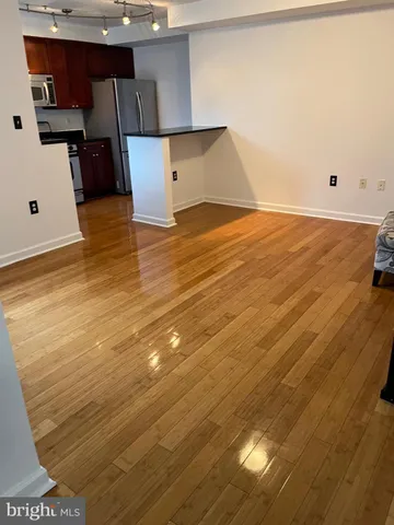 a view of a kitchen with a sink