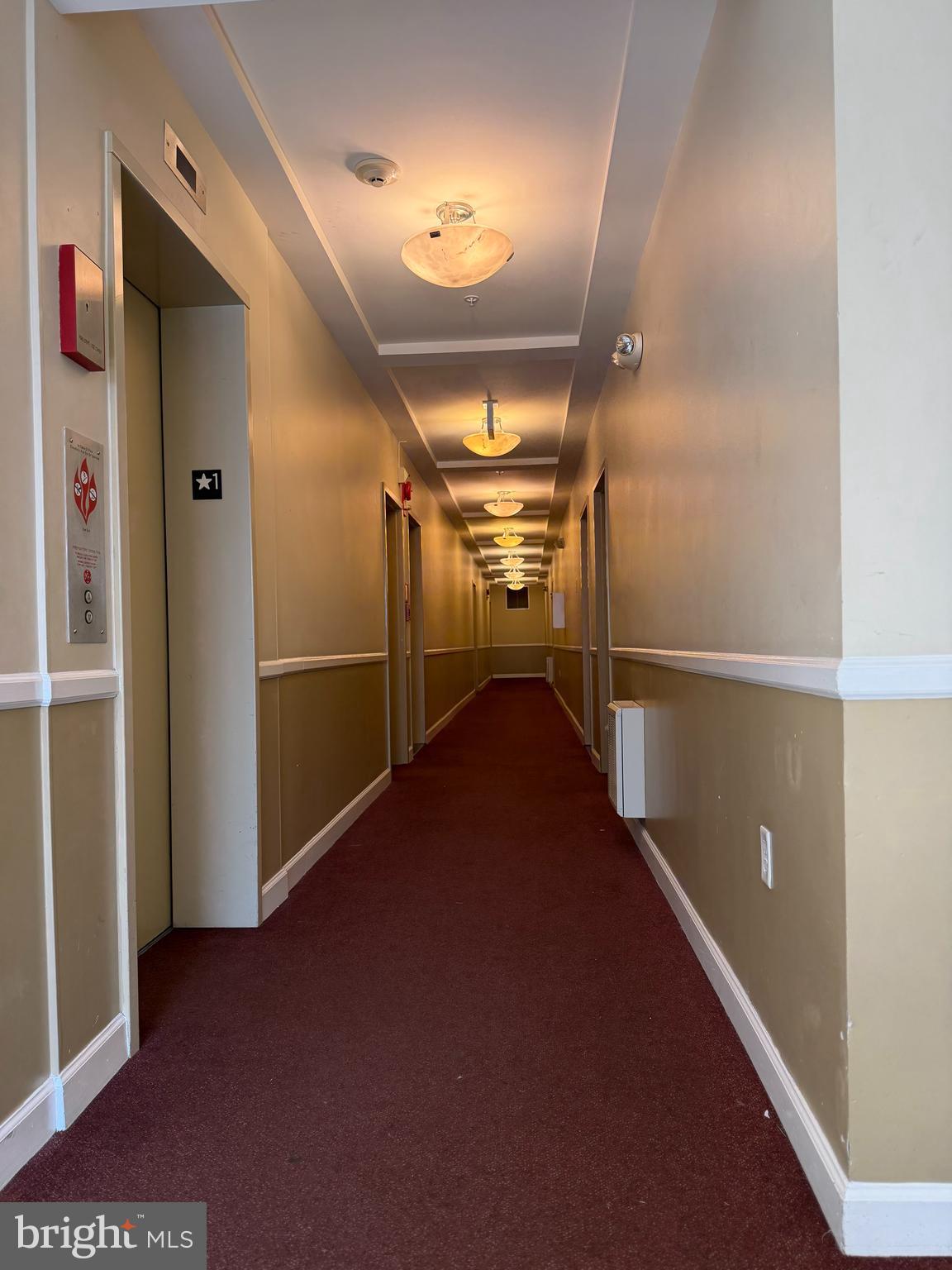 1417 Newton Street Northwest, Unit 204 Washington, DC 20010 - Photo 10 of 11 a view of hallway with stairs
