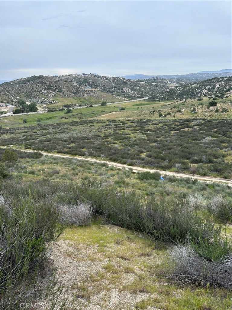 0 Sage & Villegas Road Hemet, CA 92544 - Photo 6 of 23 a view of a lake with a mountain