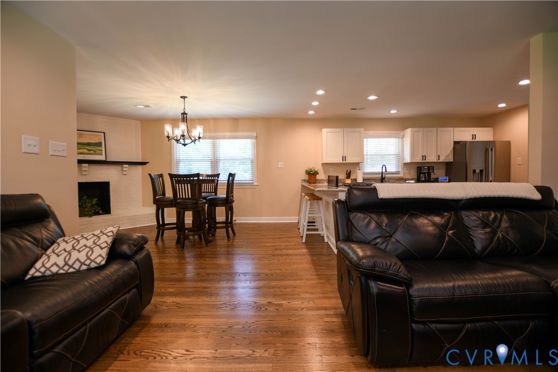 1448 Canterbury Road St. Stephens Church, VA 23148 - Photo 6 of 57 Spacious open-concept living area featuring rich h