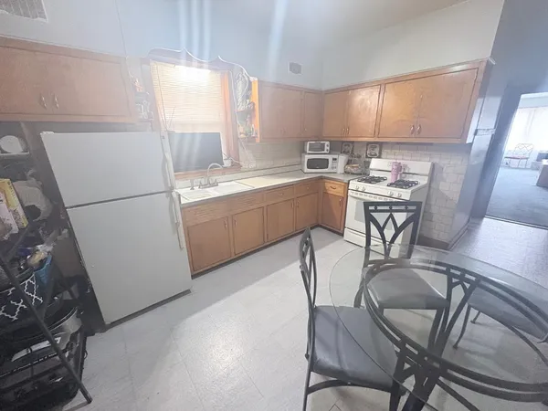 $555,000 | 2323 North Latrobe Avenue, Chicago, IL 60639