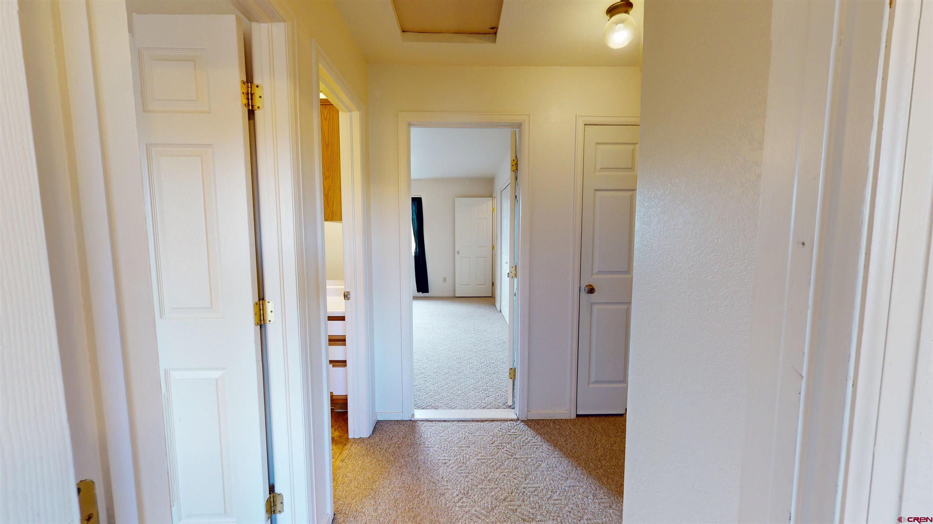 314 South 5th Street Gunnison, CO 81230 - Photo 21 of 26 a view of a bathroom from a hallway