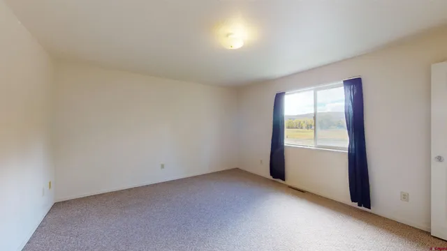 a view of a hallway with entryway