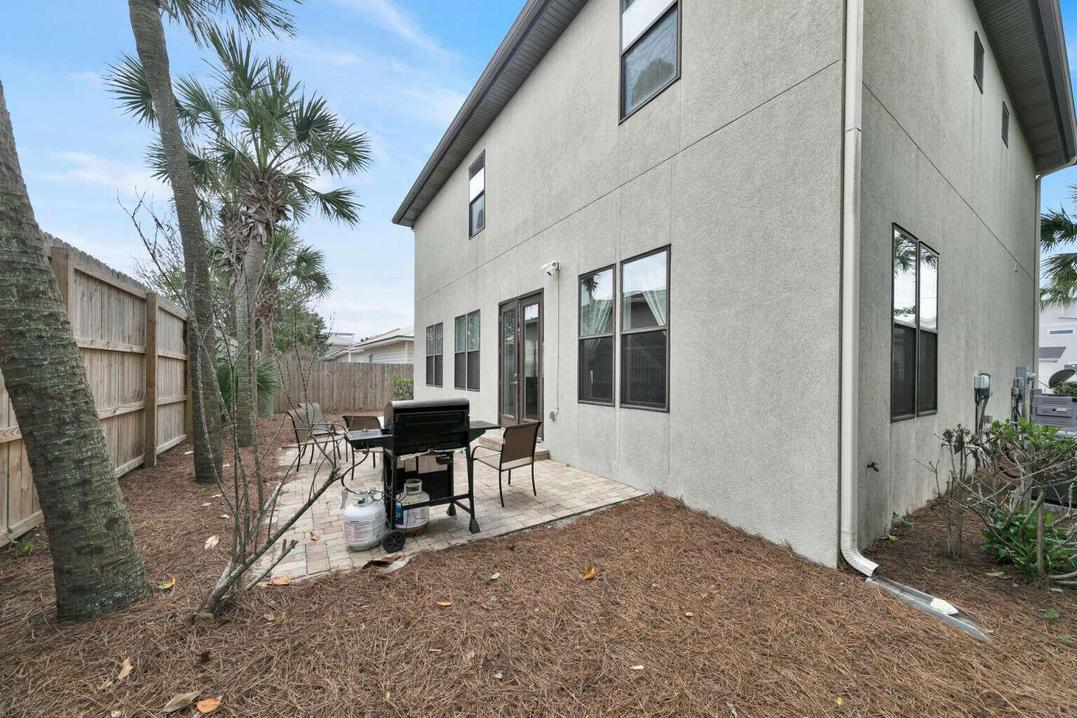 228 Miami Street Miramar Beach, FL 32550 - Photo 20 of 20 a view of a house with backyard porch and sitting area