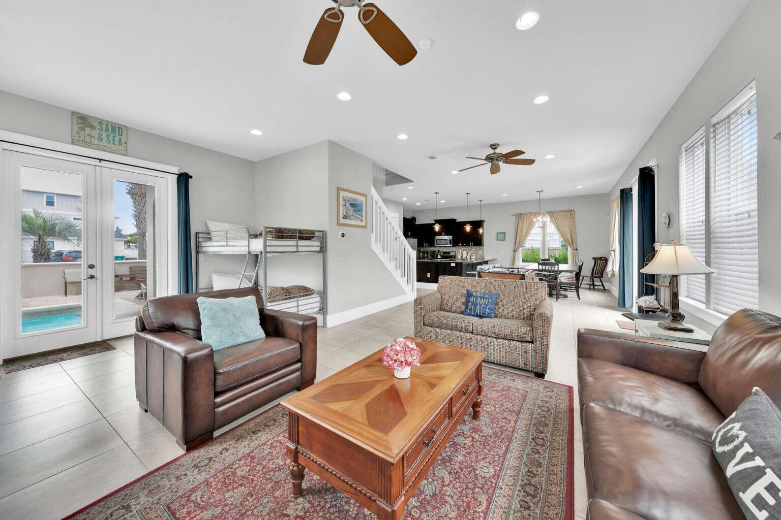 228 Miami Street Miramar Beach, FL 32550 - Photo 4 of 20 a living room with furniture and a large window
