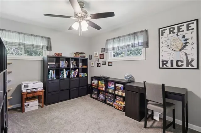 a workspace with furniture and window